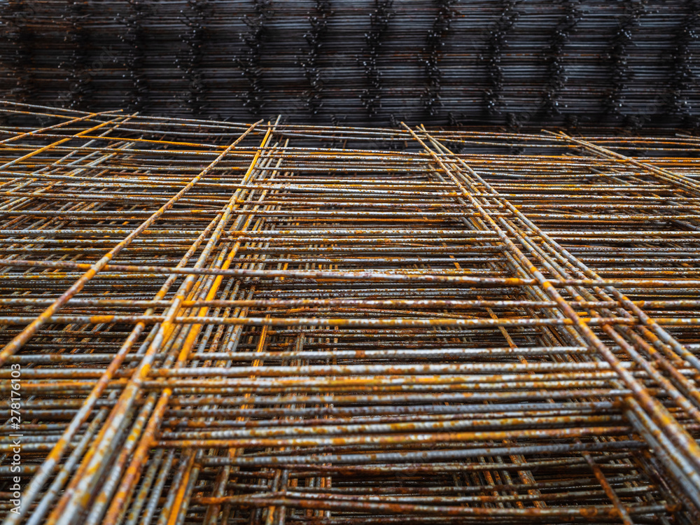 Metal construction for strengthening. Metal rusty mesh to strengthen concrete during construction