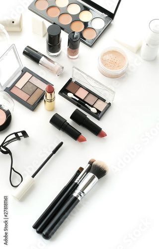 Makeup products, decorative cosmetics on white background flat lay . Fashion and beauty concept. Top view. Copy space.