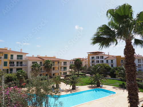 Colorful complex with exotic palm trees on african Sal island in Cape Verde