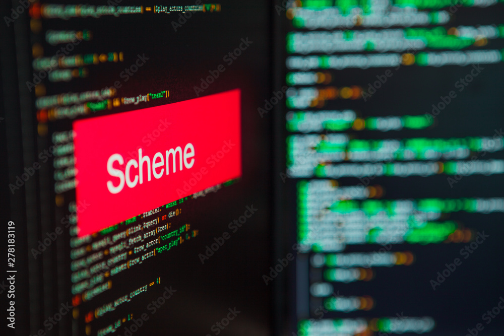 Programming language, Scheme inscription on the background of computer code.