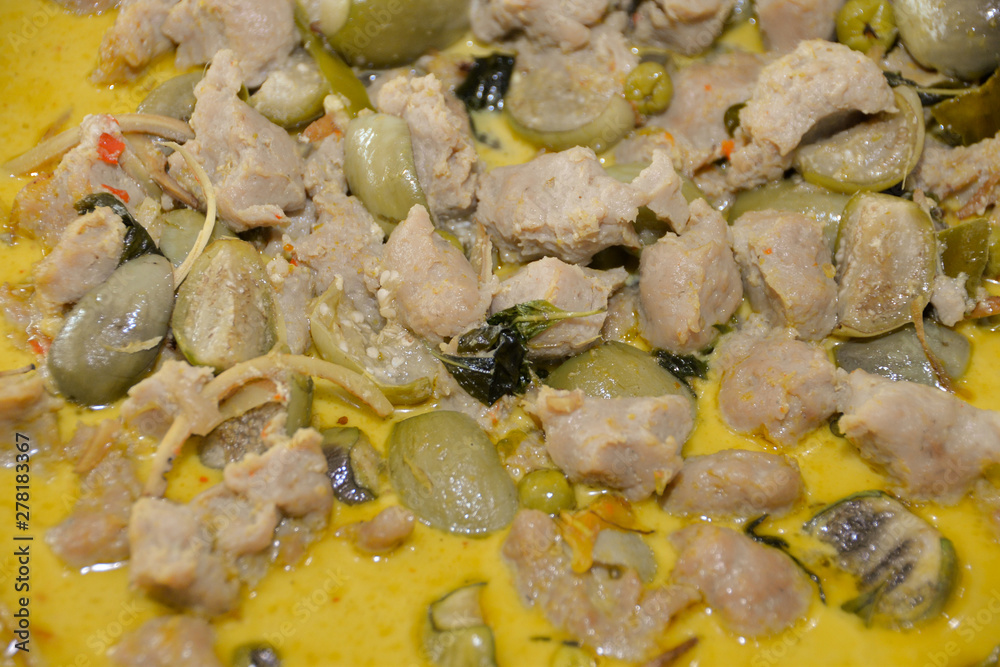 Thai style spicy fish meatball in green curry with coconut milk. Thai style spicy fish meatball in green curry with coconut milk.