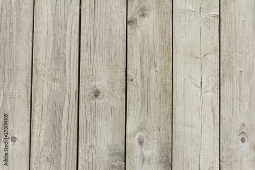 Wooden gray fence. From boards. not painted not treated. Background texture.