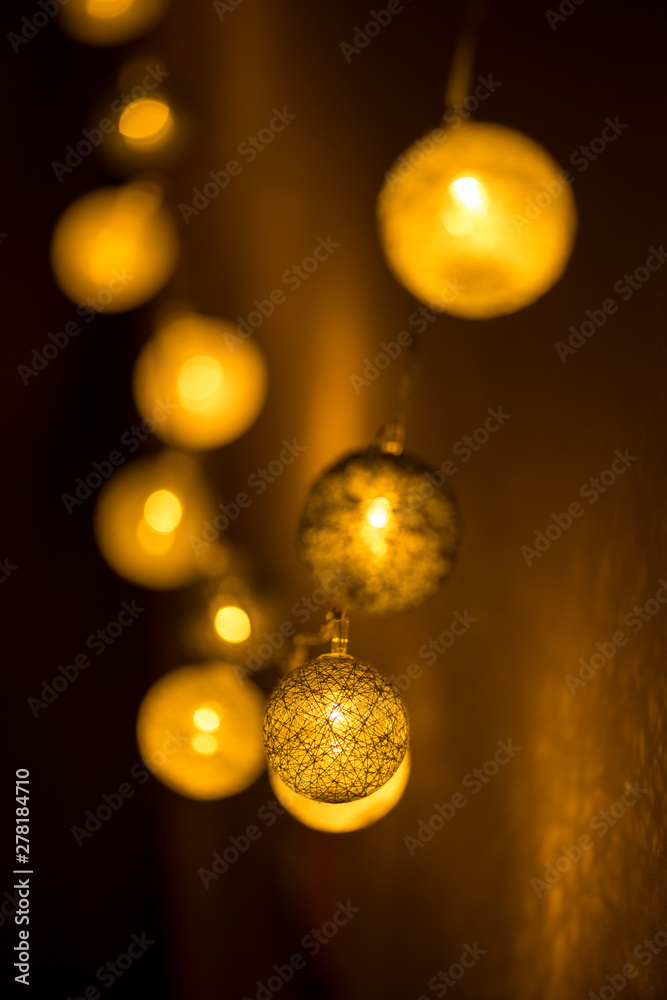 Decorative globe, light bulbs on the wall. Hanging lights. Selective focus Decorative globe, light bulbs on the wall. Hanging lights. Selective focus