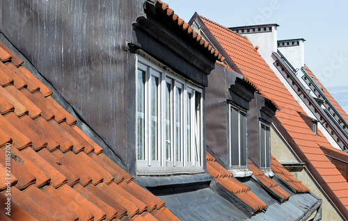 Old dormer windows in Warsaw's Old Town, Poland photo