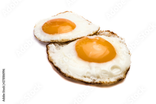 Fried eggs isolated on white background