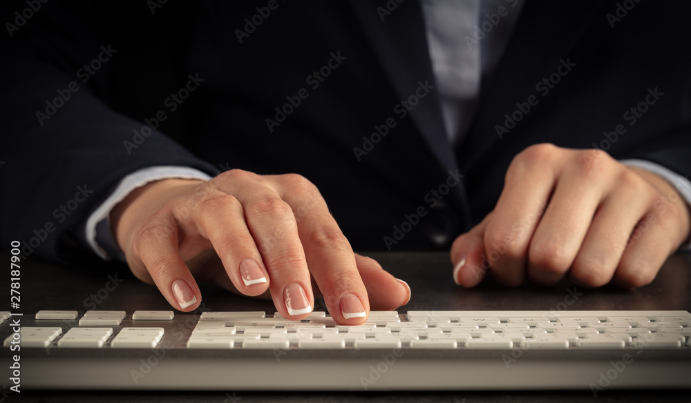 Business woman typing on keyboard Business woman typing on keyboard