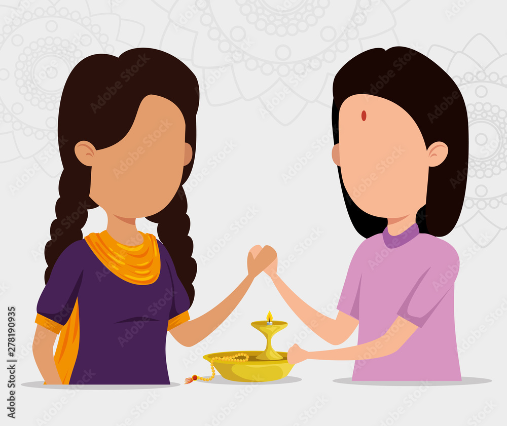hindu girls sisters with candle and bracelet hindu girls sisters with candle and bracelet