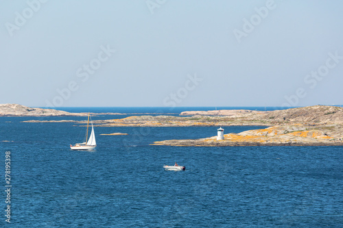 View of rocky archipelago with boats © Lars Johansson