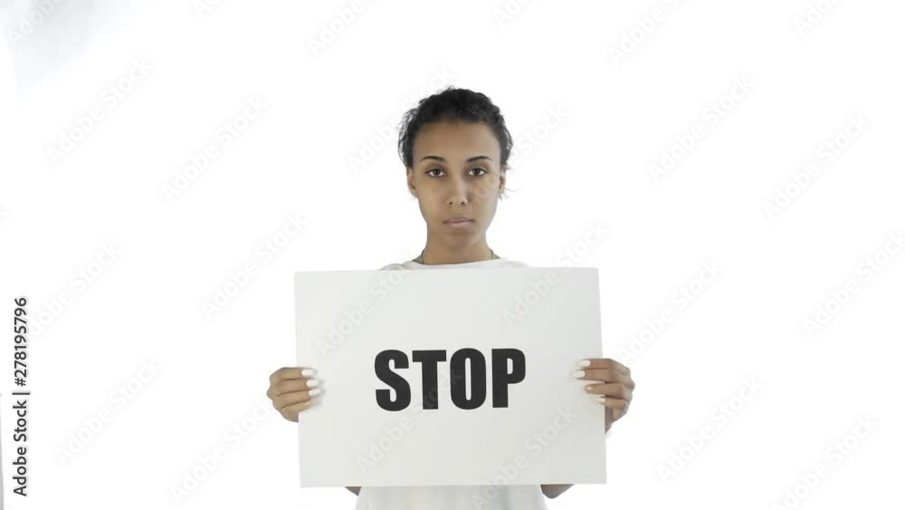 Afro-American Girl Activist With Stop Poster on white background Afro-American Girl Activist With Stop Poster on white background