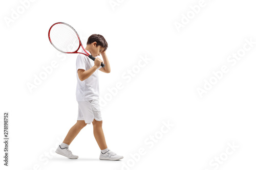 Sad boy with a tennis racquet © Ljupco Smokovski