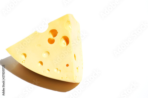 Close-up piece of cheese isolated on white background, food photo