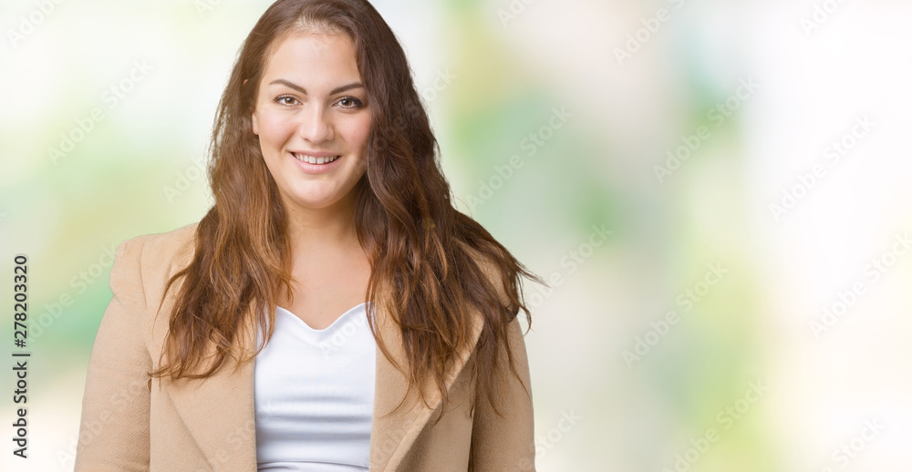 Beautiful plus size young woman wearing winter coat over isolated background with a happy and cool smile on face. Lucky person. Beautiful plus size young woman wearing winter coat over isolated background with a happy and cool smile on face. Lucky person.