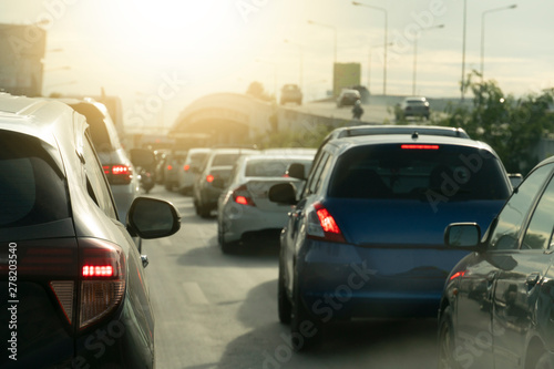 Brake cars on the road during traffic jams in urban areas, have different levels of bridges to head to other directions, smoke pollution from exhaust pipes