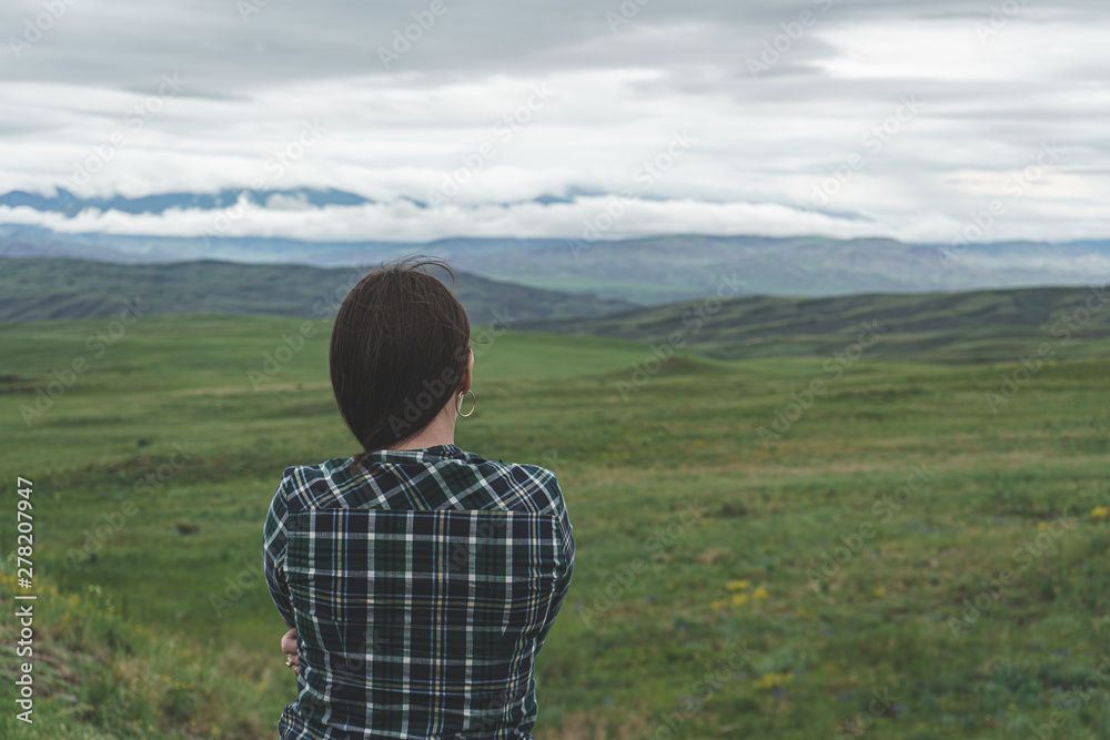 woman looking at the horizon