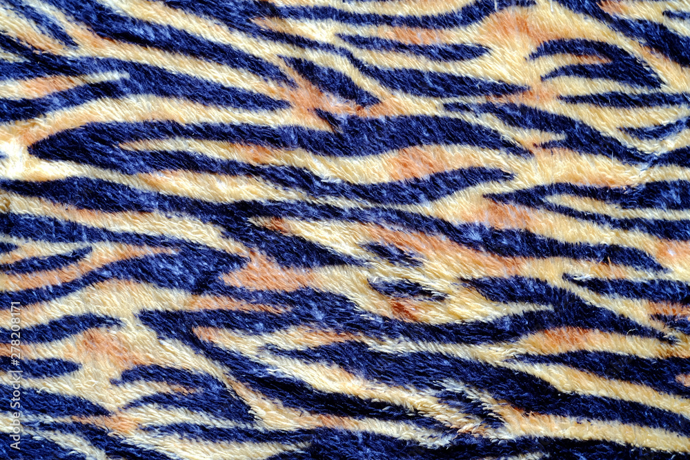 Black and yellow Tiger stripe on cloth background. Black and yellow Tiger stripe on cloth background.