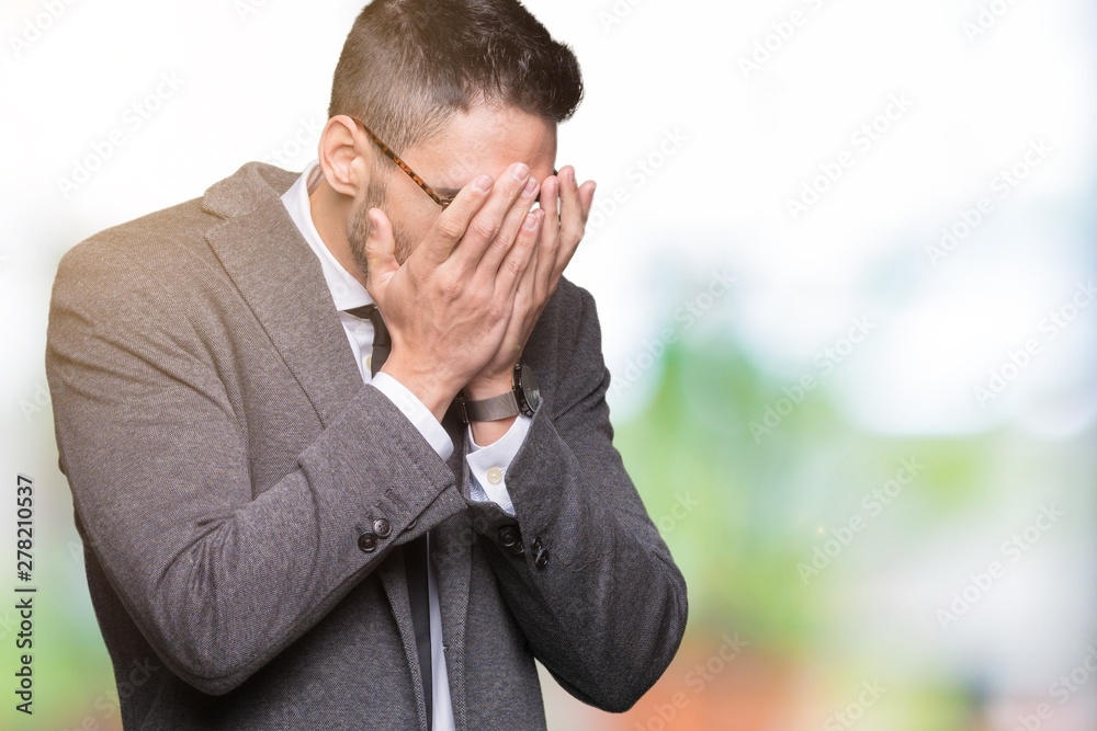 Young handsome business man over isolated background with sad expression covering face with hands while crying. Depression concept. Young handsome business man over isolated background with sad expression covering face with hands while crying. Depression concept.