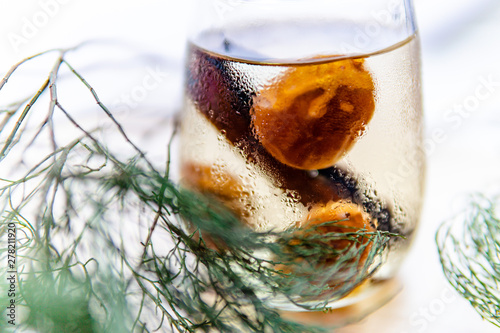 infused water dates and cinnamon with pine leaves