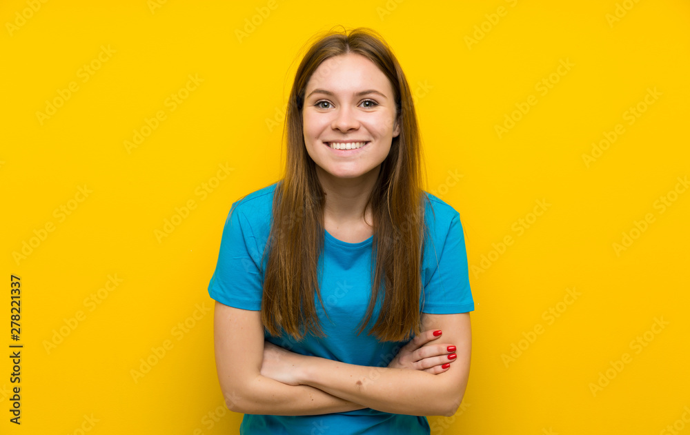 Young woman with blue shirt laughing