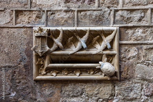 Casa de l'Ardiaca, stone letterbox with swallows and turtles, Lluis Domenech i Montaner. Barri Gotic, Barcelona. photo