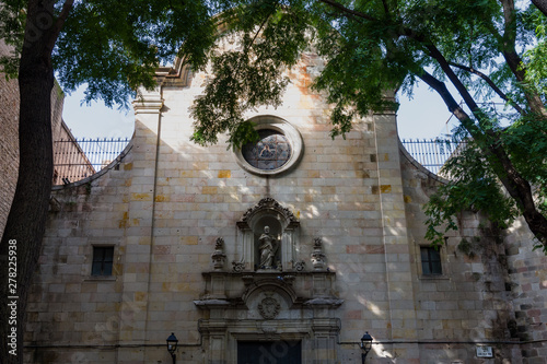 Plaza de Sant Felip Neri, the main facade bombed by pro-Francoist aviation. Barri Gotic, Barcelona. photo