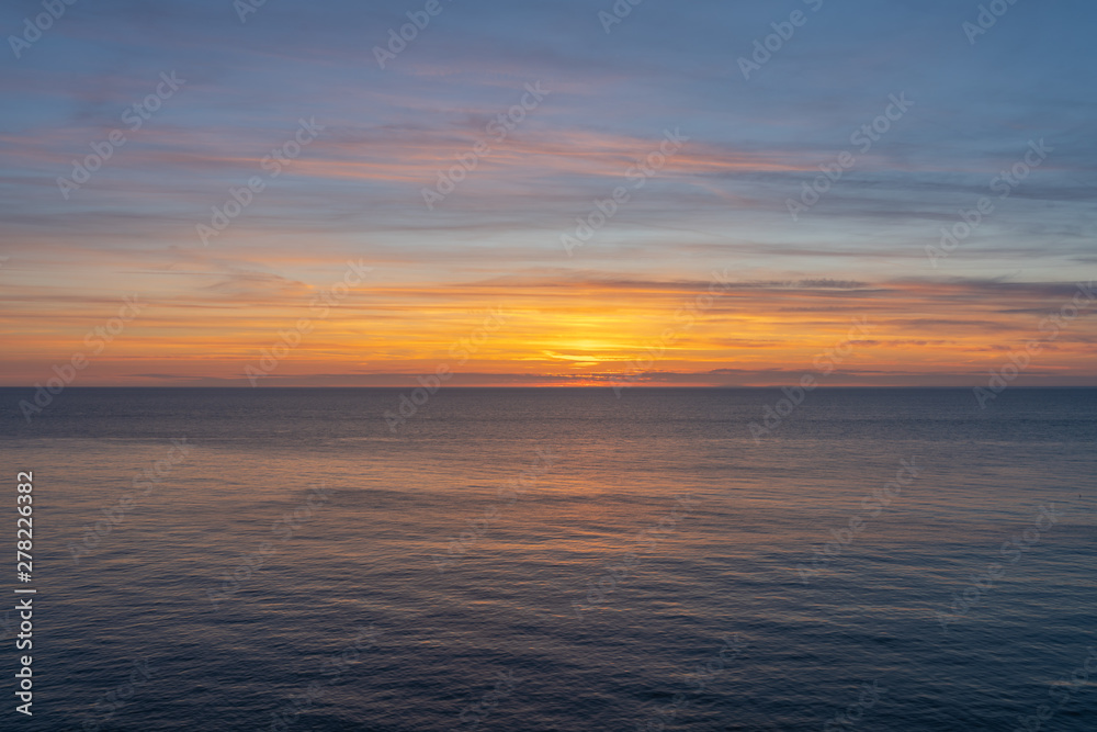 Etretat, France - 05 31 2019: sunset over the sea of Etretat