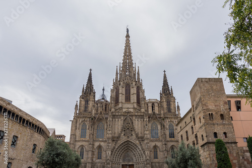 The Cathedral of Barcelona, detail of the main facade in typical gothic style with stone friezes and gargoyles. Barri Gotic, Barcelona.