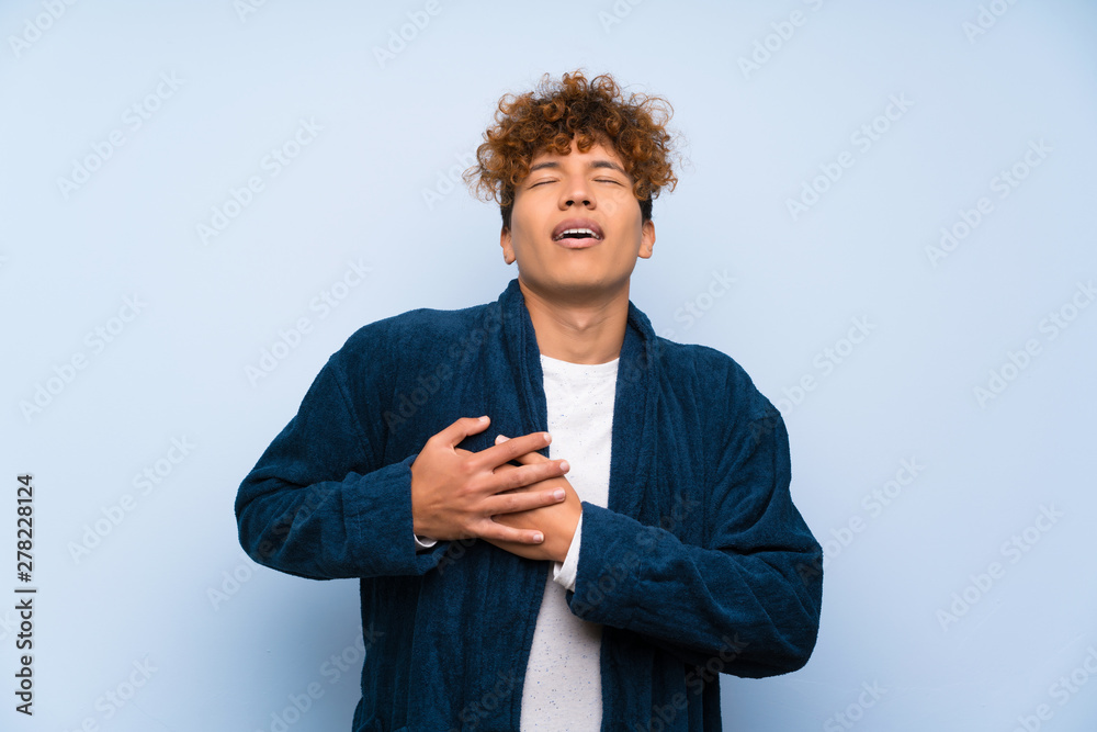Young african american man in pajamas in love Young african american man in pajamas in love