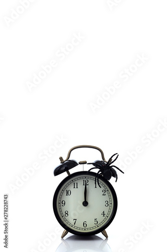 Clock with spider for Halloween celebration photo