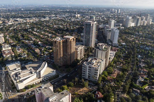 Aerial view of partment towers  streets and homes along the Wilshire Blvd in West Los Angeles  California.