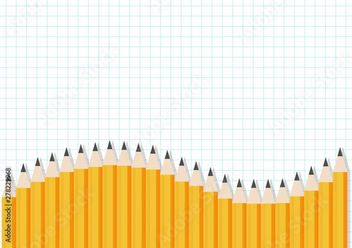Yellow pencils writing on copybook