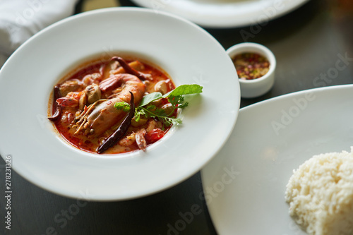 Tom yam kung with rice and fish sauce dip in Thai traditional famous dish