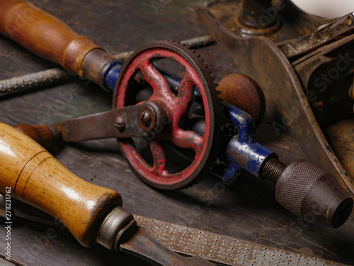 woodcarving tools on a wood workbench