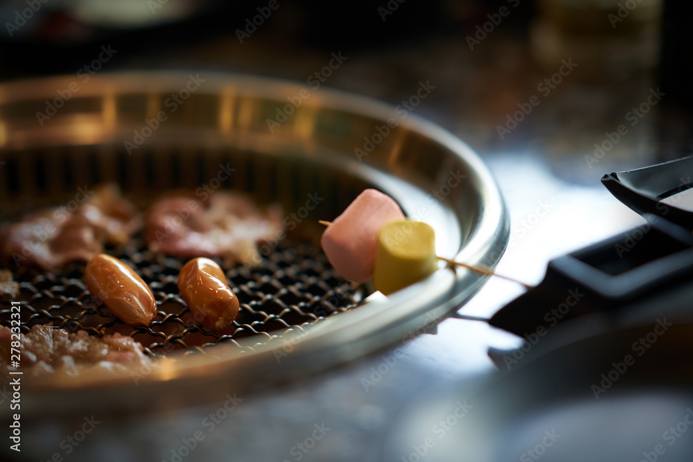 Grilling Marshmallows on asian grill style Grilling Marshmallows on asian grill style