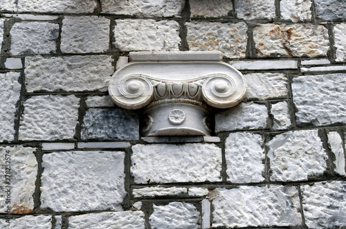 marble capital in a wall