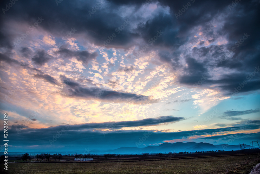 Clouds at the sunset Clouds at the sunset