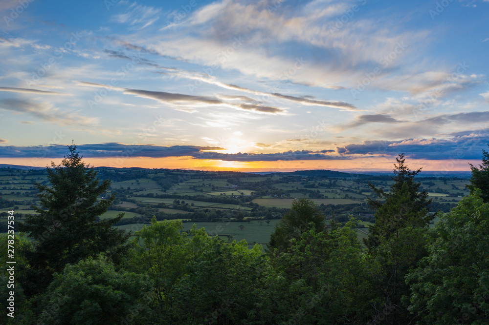 Dramatic Sunset Clouds over Scenic Valley in Shropshire, UK