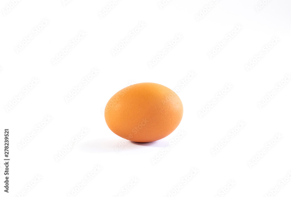 Closeup of raw egg on white background Closeup of raw egg on white background