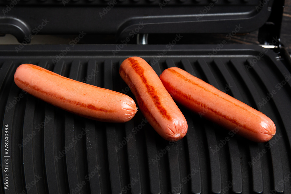 barbecue grilled sausages on the grill surface barbecue grilled sausages on the grill surface