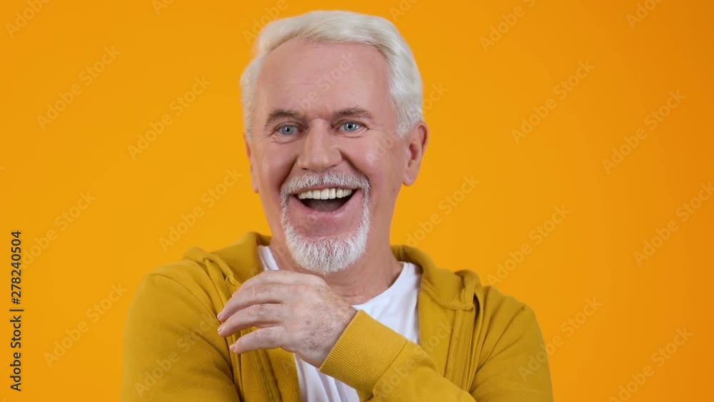 Amazed mature man feeling happy, good news, surprise reaction, astonishment
