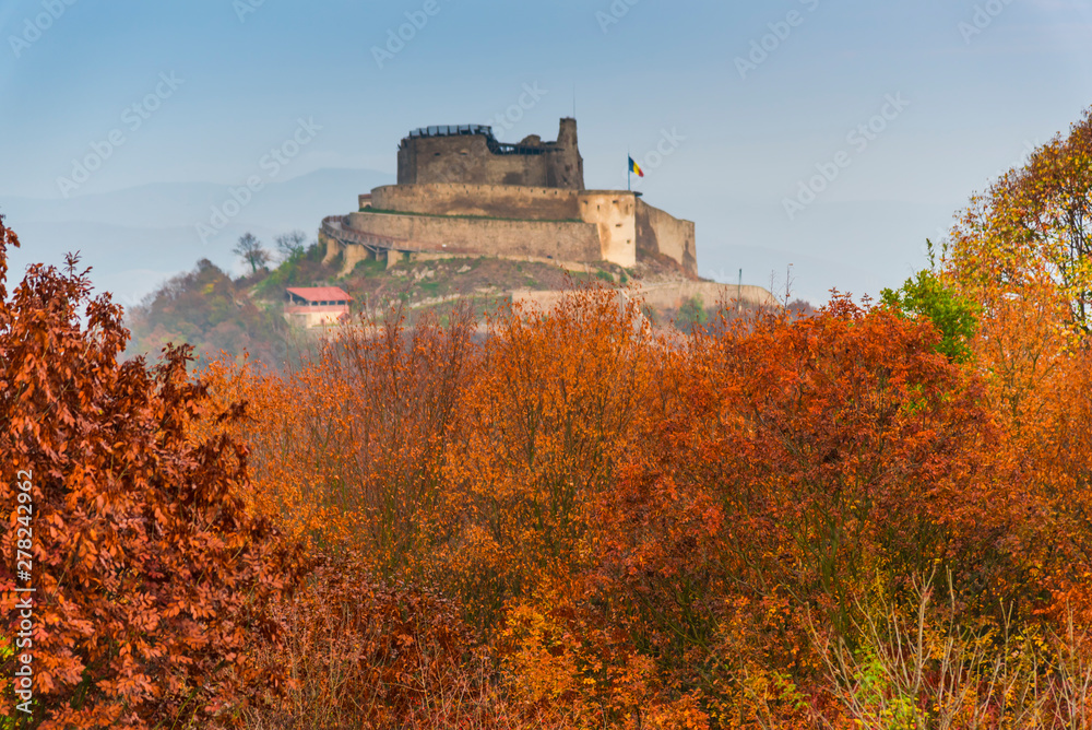 Autumn landscape with Deva citadel, view from the hill