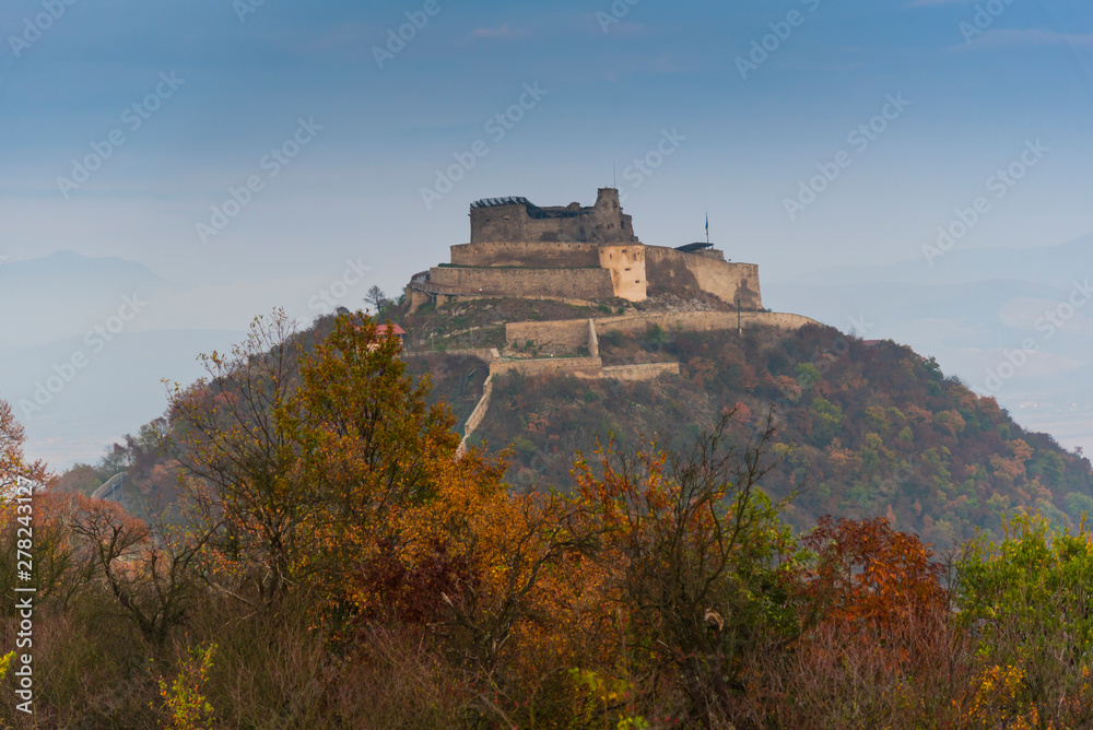 Autumn landscape with Deva citadel, view from the hill