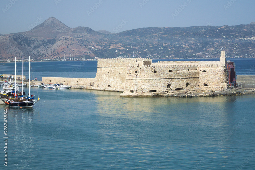 Greece, Crete. historic fortification at Heraklion harbor. Beautiful Venitian Rocca a Mare Fortress at the port on a summer day.