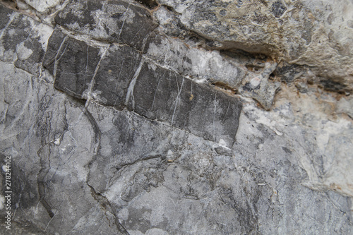 Cave wall/Surface of a cave/Stone surface/Stone background texture. photo