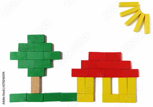 house  tree and sunbeams laid with colored blocks