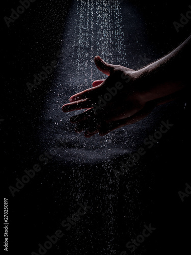 A Caucasian Man s Hands Washing Under a Stream of Water - with a Dark  Moody Background