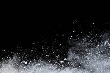 White powder explosion on black background. Colored cloud. Colorful dust explode. Paint Holi.