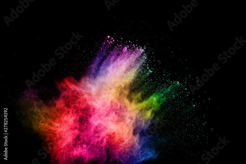 abstract colored dust explosion on a black background.abstract powder splatted background,Freeze motion of color powder exploding/throwing color powder, multicolored glitter texture.