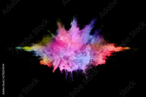 abstract colored dust explosion on a black background.abstract powder splatted background,Freeze motion of color powder exploding/throwing color powder, multicolored glitter texture.