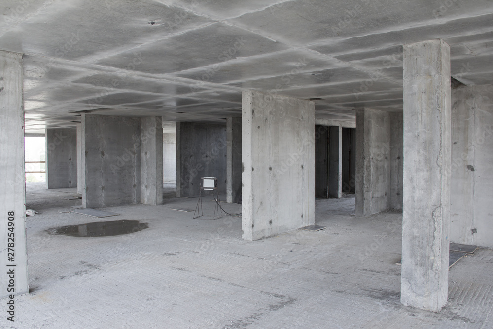 Reinforced concrete walls in a building under construction.