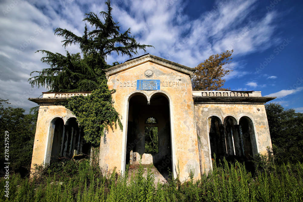 Fototapeta premium Sukhumi, Georgia - 09.19.2018: Abandoned building of the railway stop in Gulripsh village.